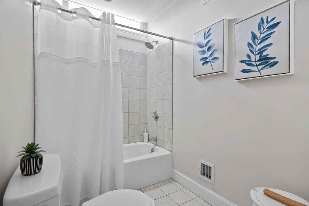 52 Pineswamp Road Ipswich, MA 01938 - Photo 21 of 41 a bathroom with a shower a toilet and a tub