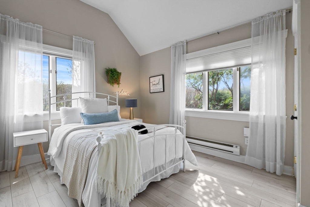 52 Pineswamp Road Ipswich, MA 01938 - Photo 23 of 41 a room with a bed and a window