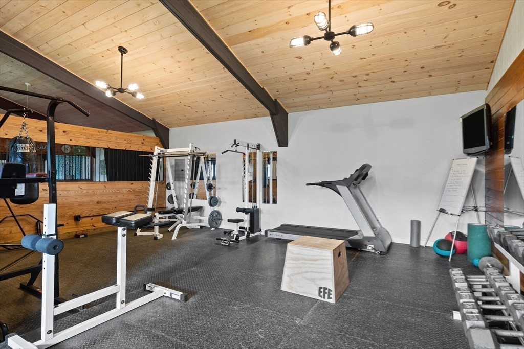 52 Pineswamp Road Ipswich, MA 01938 - Photo 26 of 41 a view of a room with gym equipment