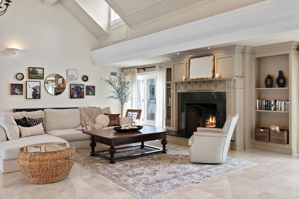 52 Pineswamp Road Ipswich, MA 01938 - Photo 29 of 41 a living room with furniture and a fireplace