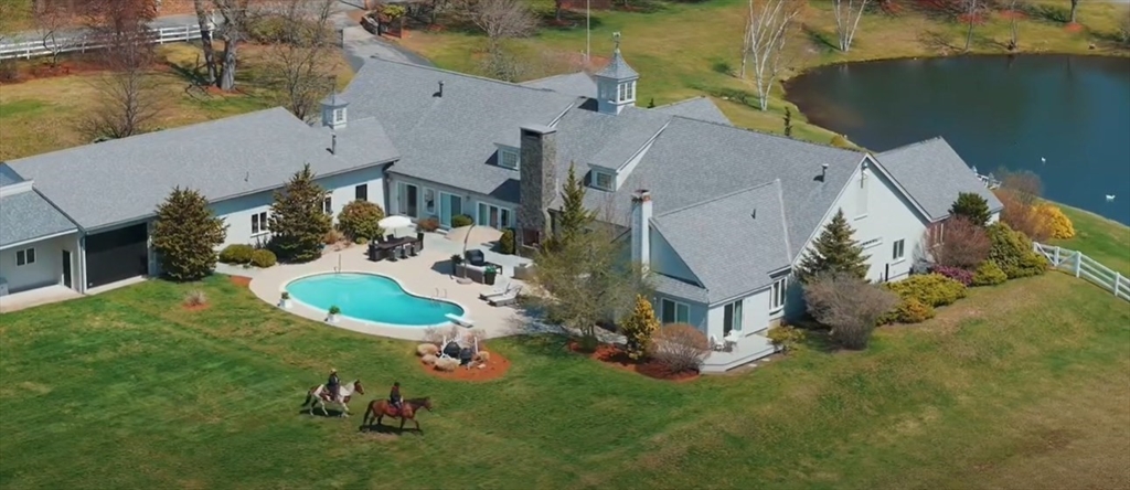 52 Pineswamp Road Ipswich, MA 01938 - Photo 32 of 41 an aerial view of a house with a swimming pool