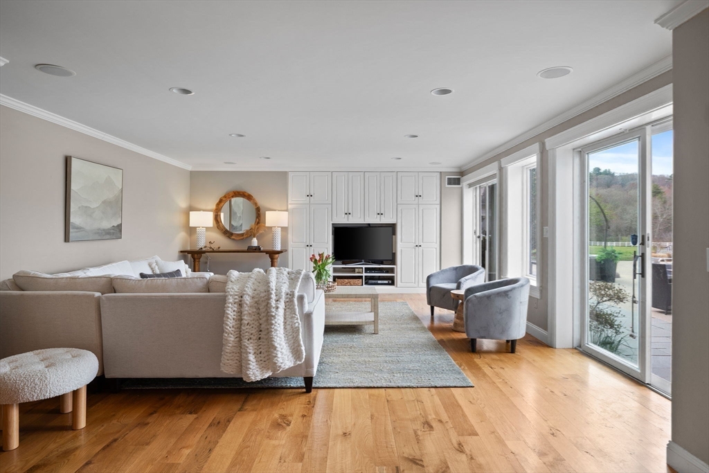 52 Pineswamp Road Ipswich, MA 01938 - Photo 5 of 41 a living room with furniture and a flat screen tv