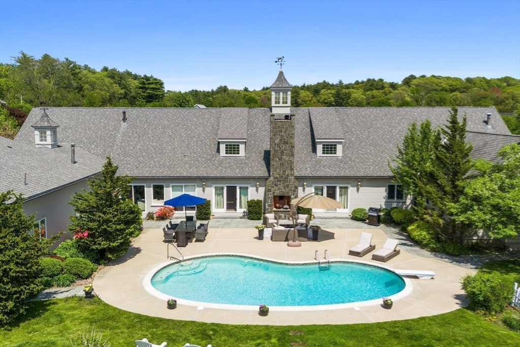 52 Pineswamp Road Ipswich, MA 01938 - Photo 8 of 41 a view of pool with lawn chairs and palm tree