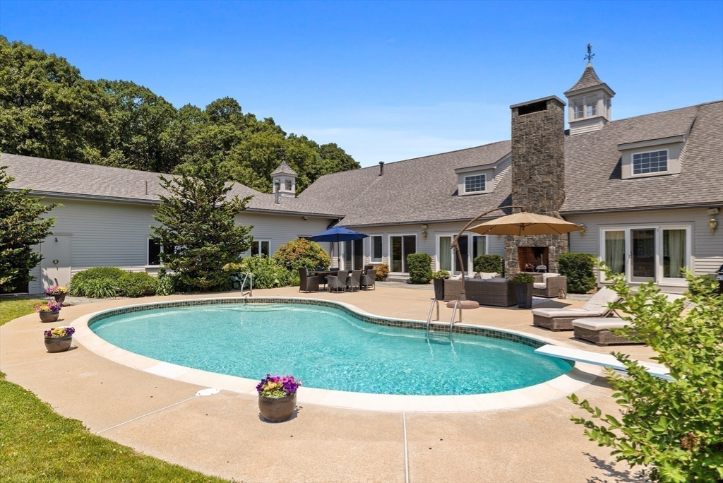 52 Pineswamp Road Ipswich, MA 01938 - Photo 9 of 41 a view of a house with swimming pool and sitting area