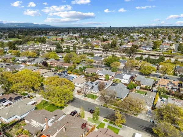an aerial view of residential building with parking space