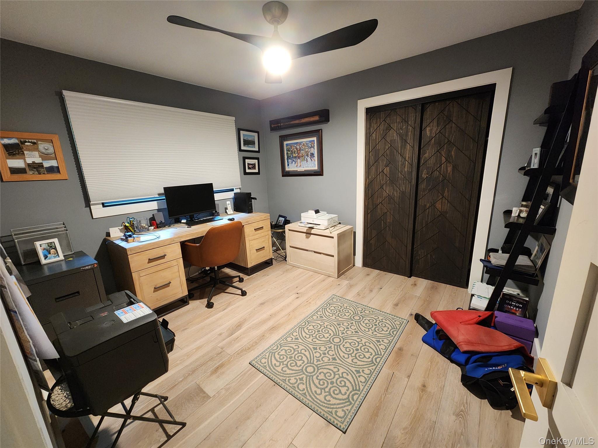 53 Lake Pleasant Road Staatsburg, NY 12580 - Photo 27 of 34 a room with furniture and wooden floor