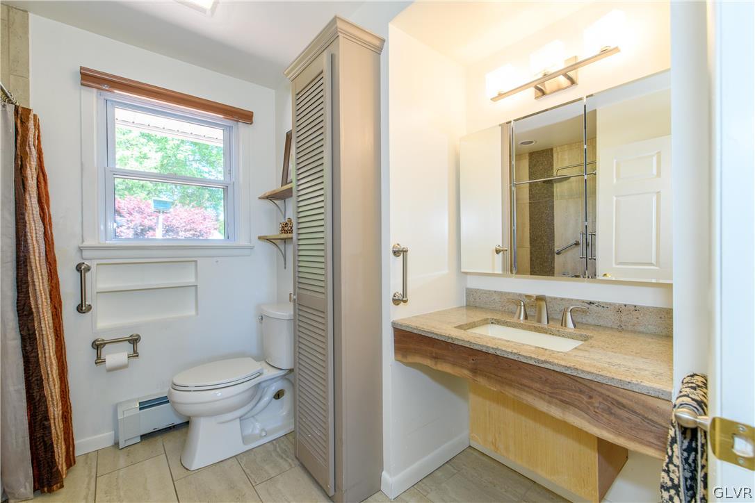 405 Moorestown Drive Bath, PA 18014 - Photo 19 of 50 a bathroom with a sink a toilet and shower