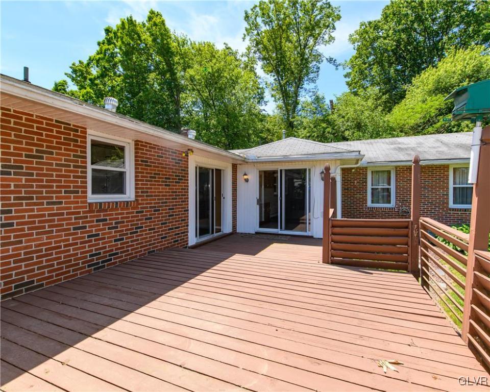 405 Moorestown Drive Bath, PA 18014 - Photo 37 of 50 a front view of a house with barbeque oven and seating space