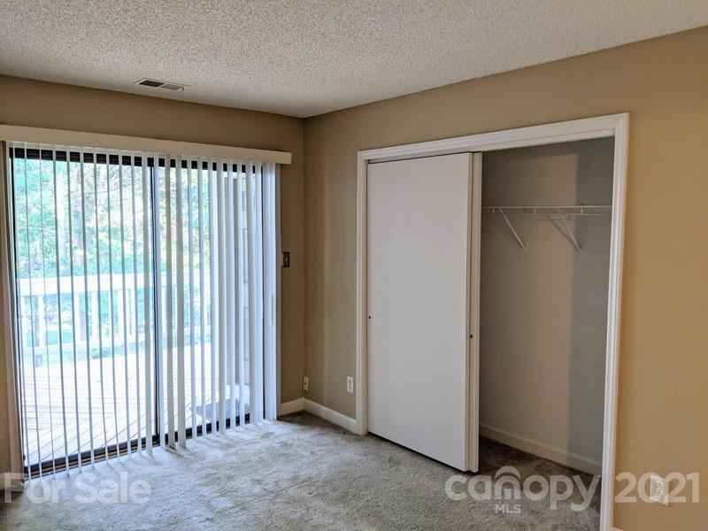 1608 Sharon Road West, Unit 48 Charlotte, NC 28210 - Photo 13 of 15 a view of a room with a large window