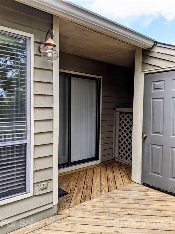 1608 Sharon Road West, Unit 48 Charlotte, NC 28210 - Photo 3 of 15 a view of a entryway door of the house