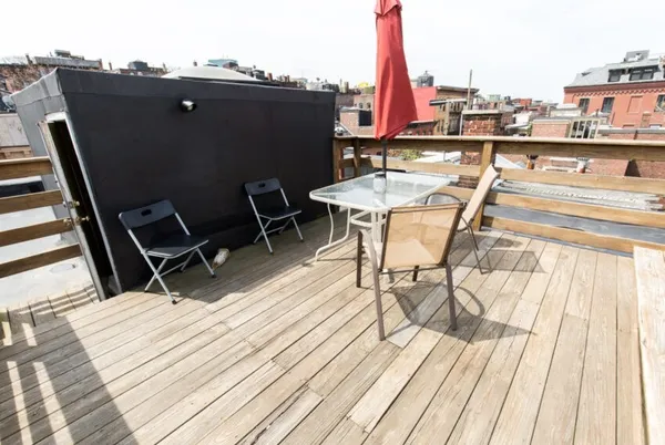 a view of a terrace with seating area