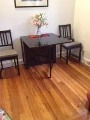 a view of a workspace with furniture