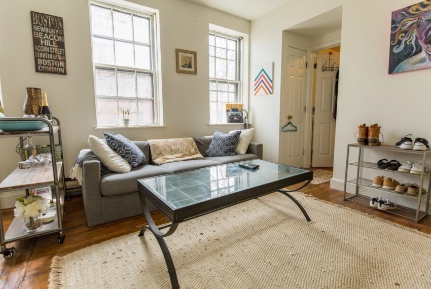 11 Phillips Street, Unit 5 Boston, MA 02114 - Photo 9 of 17 a living room with furniture and a window