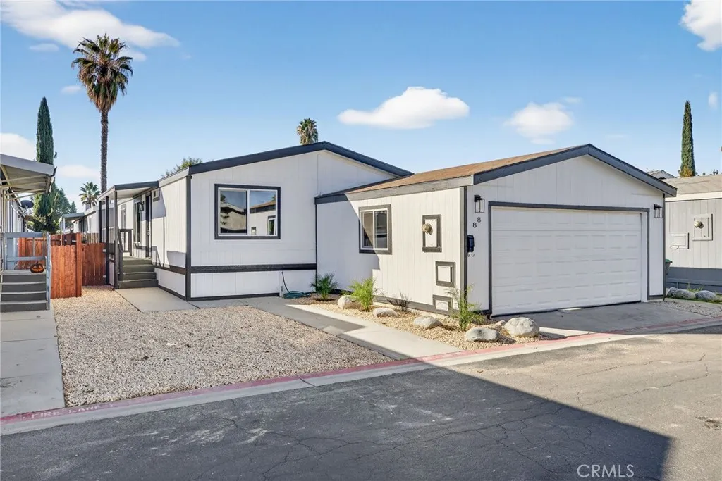 80 Dawes, Unit 88 Perris, CA 92571 - Photo 1 of 29 a view of a house with snow on the road