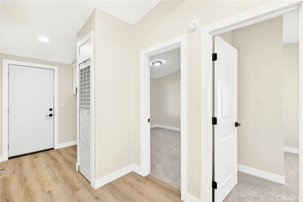 80 Dawes, Unit 88 Perris, CA 92571 - Photo 12 of 29 a view of a bathroom with wooden floor