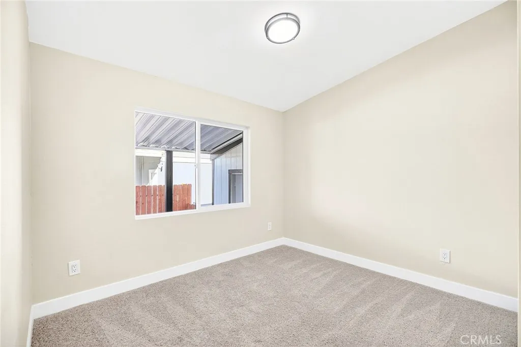 80 Dawes, Unit 88 Perris, CA 92571 - Photo 14 of 29 an empty room with windows