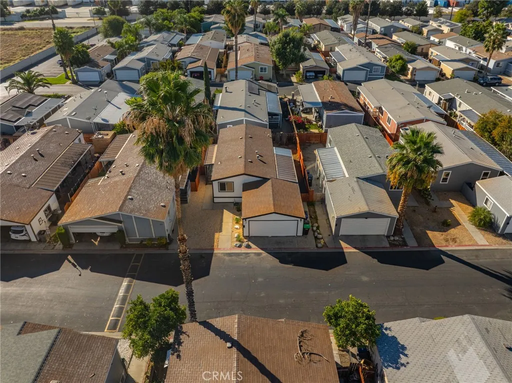 80 Dawes, Unit 88 Perris, CA 92571 - Photo 26 of 29 an aerial view of residential houses with parking