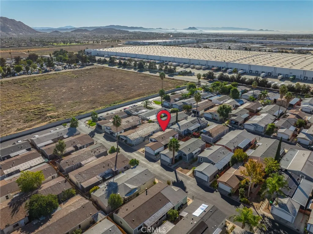 80 Dawes, Unit 88 Perris, CA 92571 - Photo 27 of 29 an aerial view of a house with a lake view