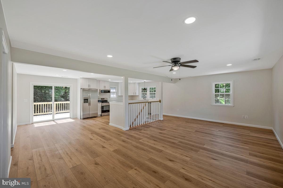13304 Cherry Tree Crossing Road Brandywine, MD 20613 - Photo 30 of 32 Spacious, sunlit open living area.