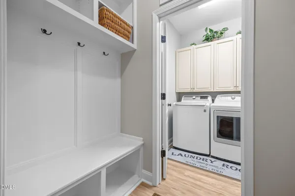 a bathroom with a granite countertop sink mirror and toilet