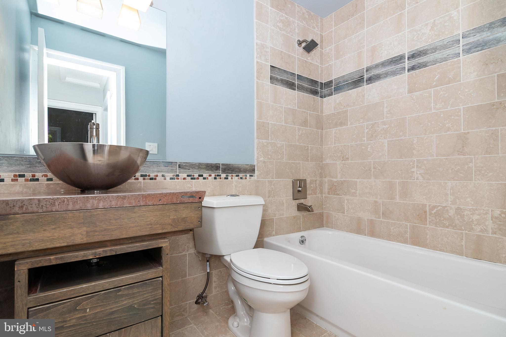 5974 Grand Banks Road Columbia, MD 21044 - Photo 30 of 36 Renovated hall bath with up-to-the-second style