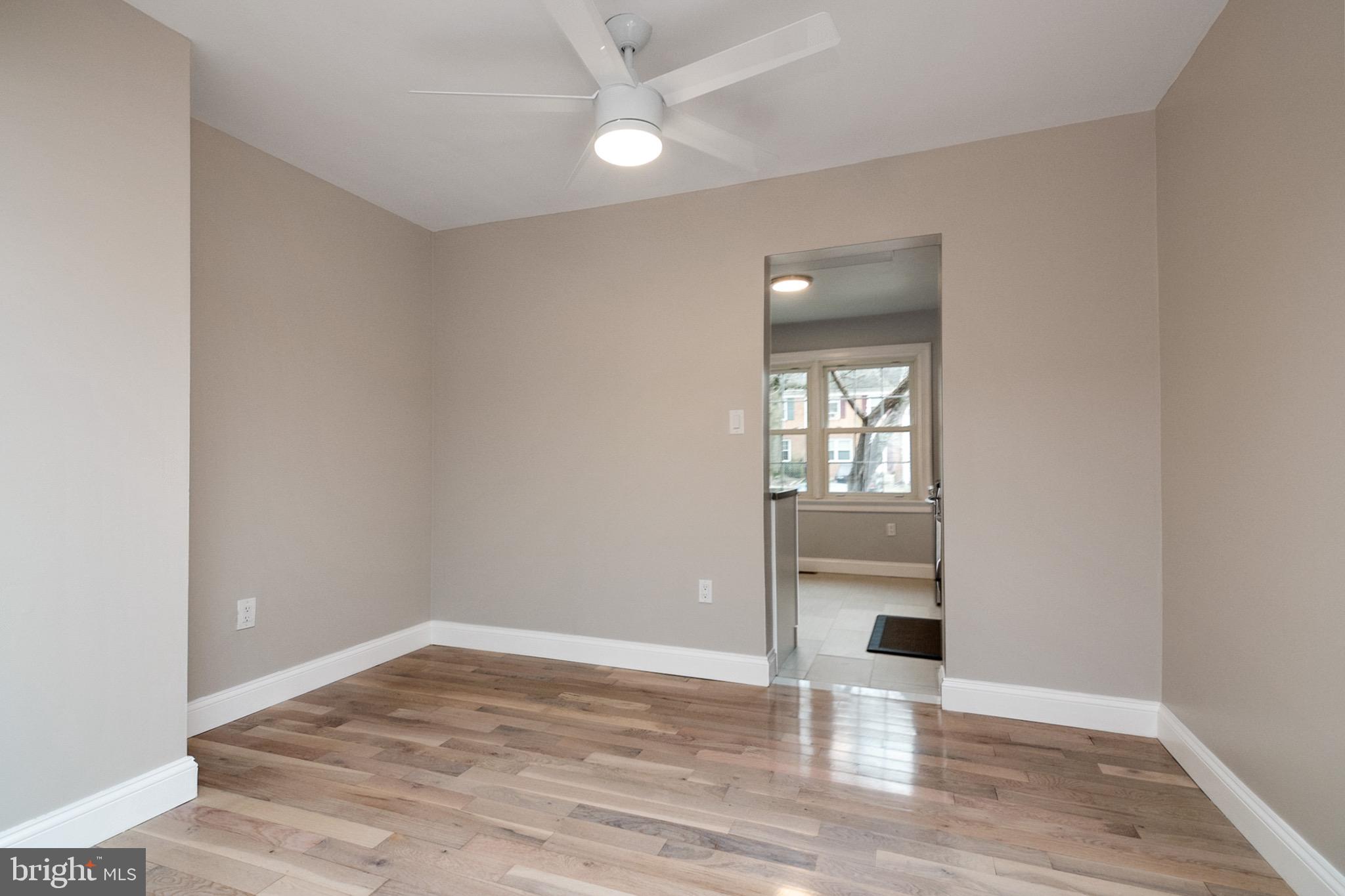 5974 Grand Banks Road Columbia, MD 21044 - Photo 10 of 36 Dining room with ceiling fan and hardwood floors