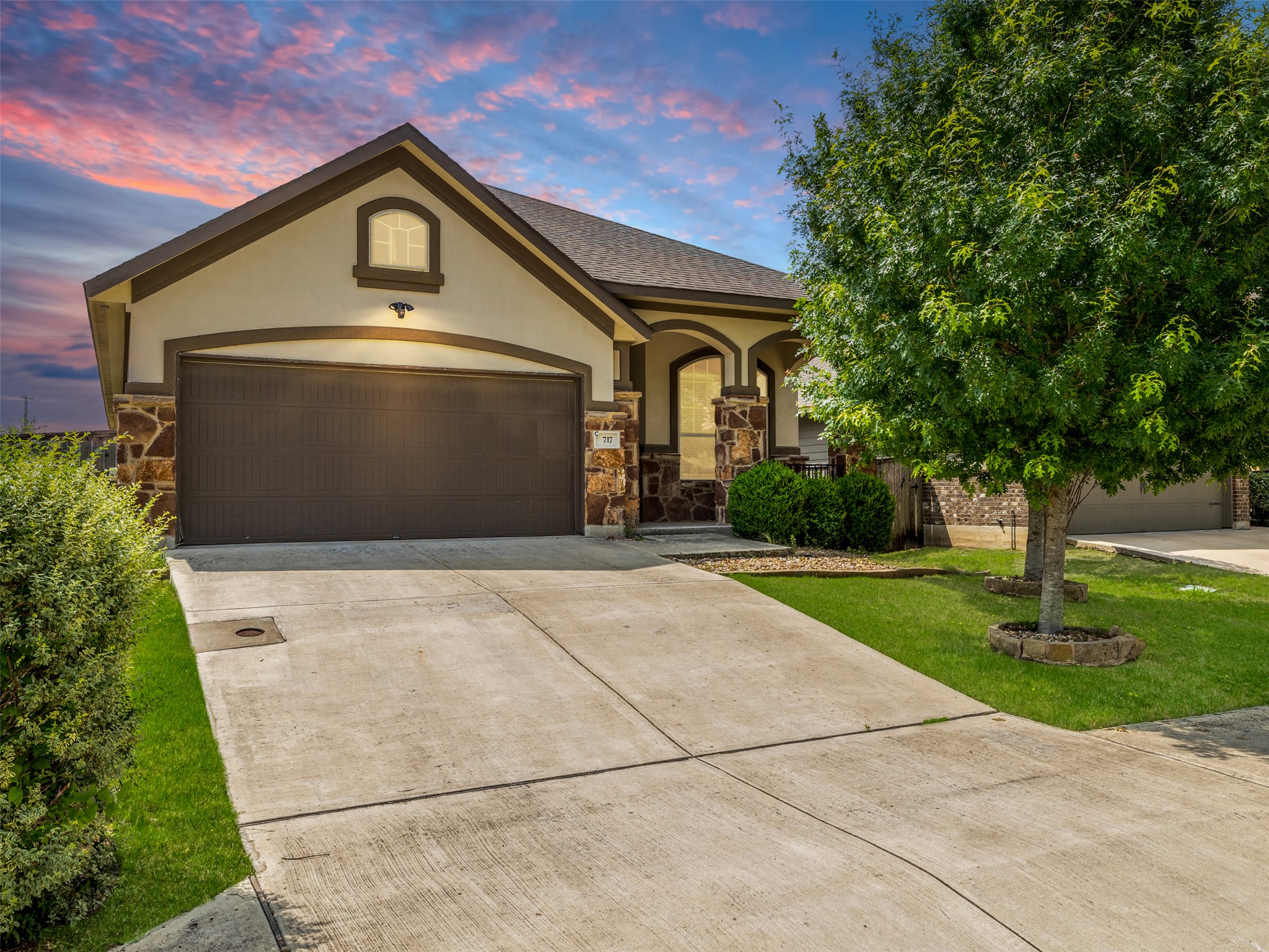 717 Blue Agave Lane Georgetown, TX 78626 - Photo 1 of 28 a front view of a house with a yard