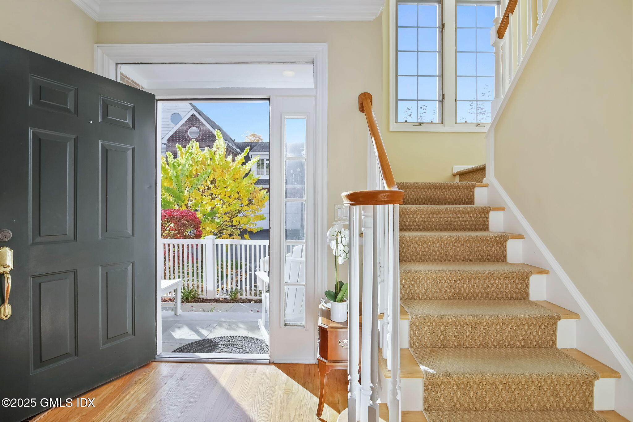 73 Weaver Street, Unit 4 Greenwich, CT 06831 - Photo 3 of 30 a view of entryway with wooden floor and windows