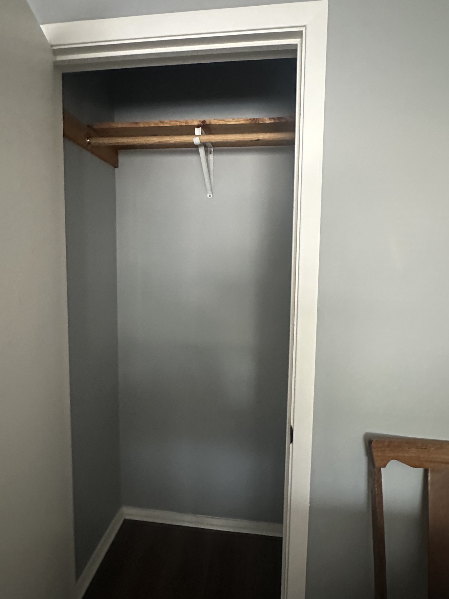 2215 Post Road, Unit 2044 Austin, TX 78704 - Photo 22 of 34 Functional closet storage featuring a sturdy wooden hanging rod and upper shelf.