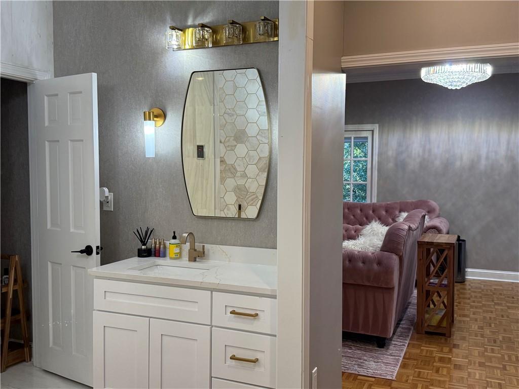 3508 Paces Place Northwest Atlanta, GA 30327 - Photo 17 of 25 a bathroom with a sink and a mirror