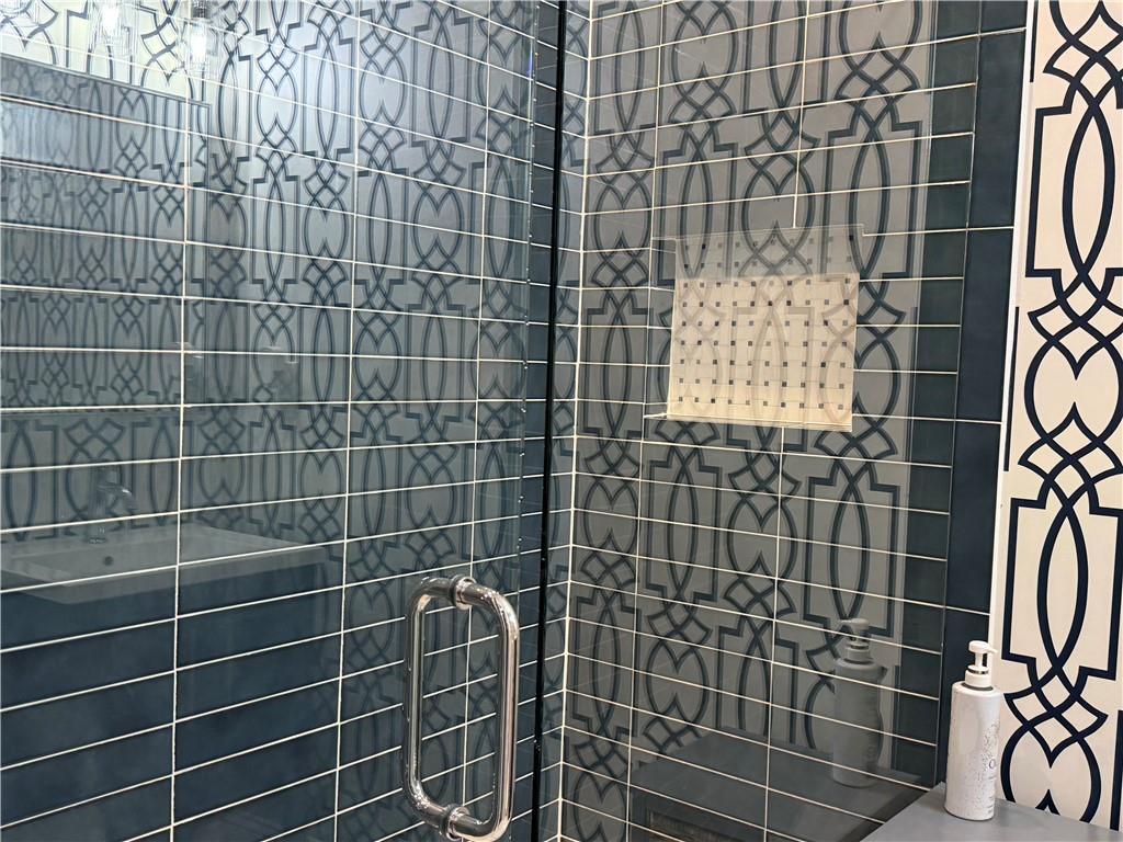 3508 Paces Place Northwest Atlanta, GA 30327 - Photo 23 of 25 a bathroom with a shower