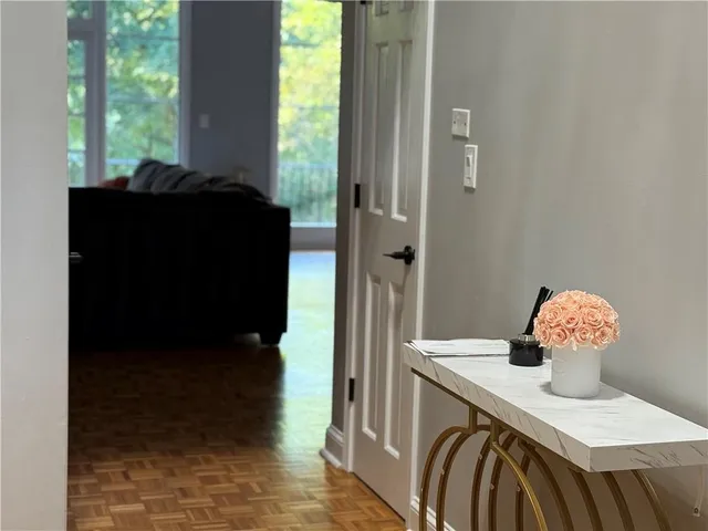 a view of a hallway with washer and dryer