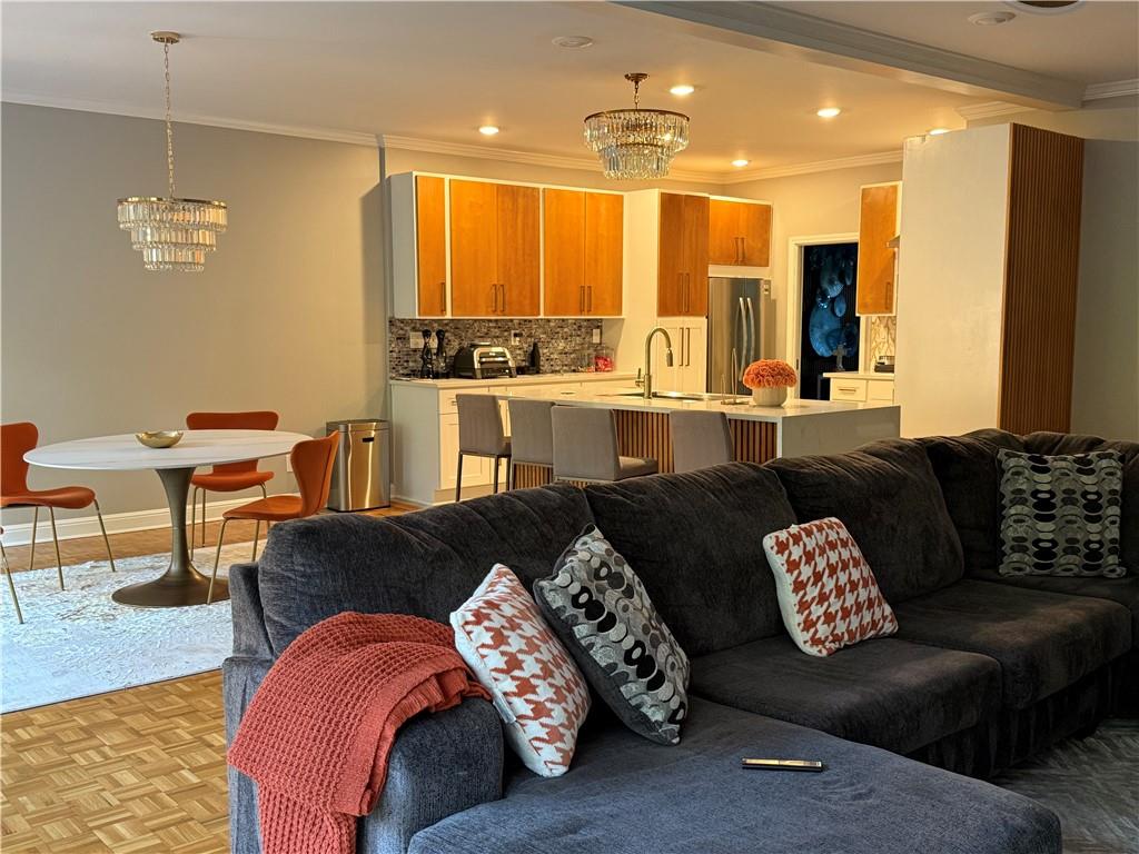 3508 Paces Place Northwest Atlanta, GA 30327 - Photo 7 of 25 a living room with furniture and a large window