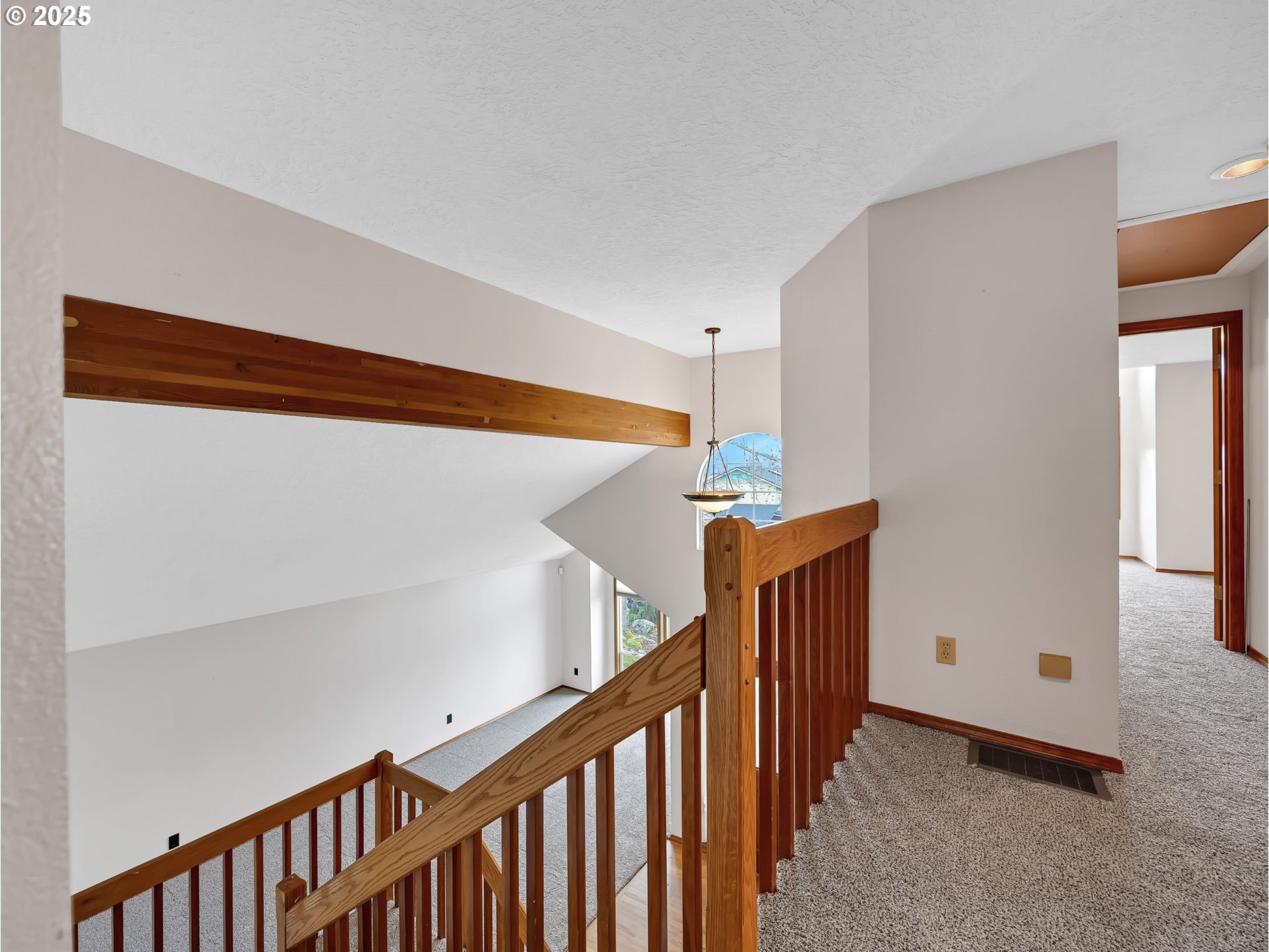 2568 Southwest Orchard Court Gresham, OR 97080 - Photo 18 of 46 a view of a hallway with stairs