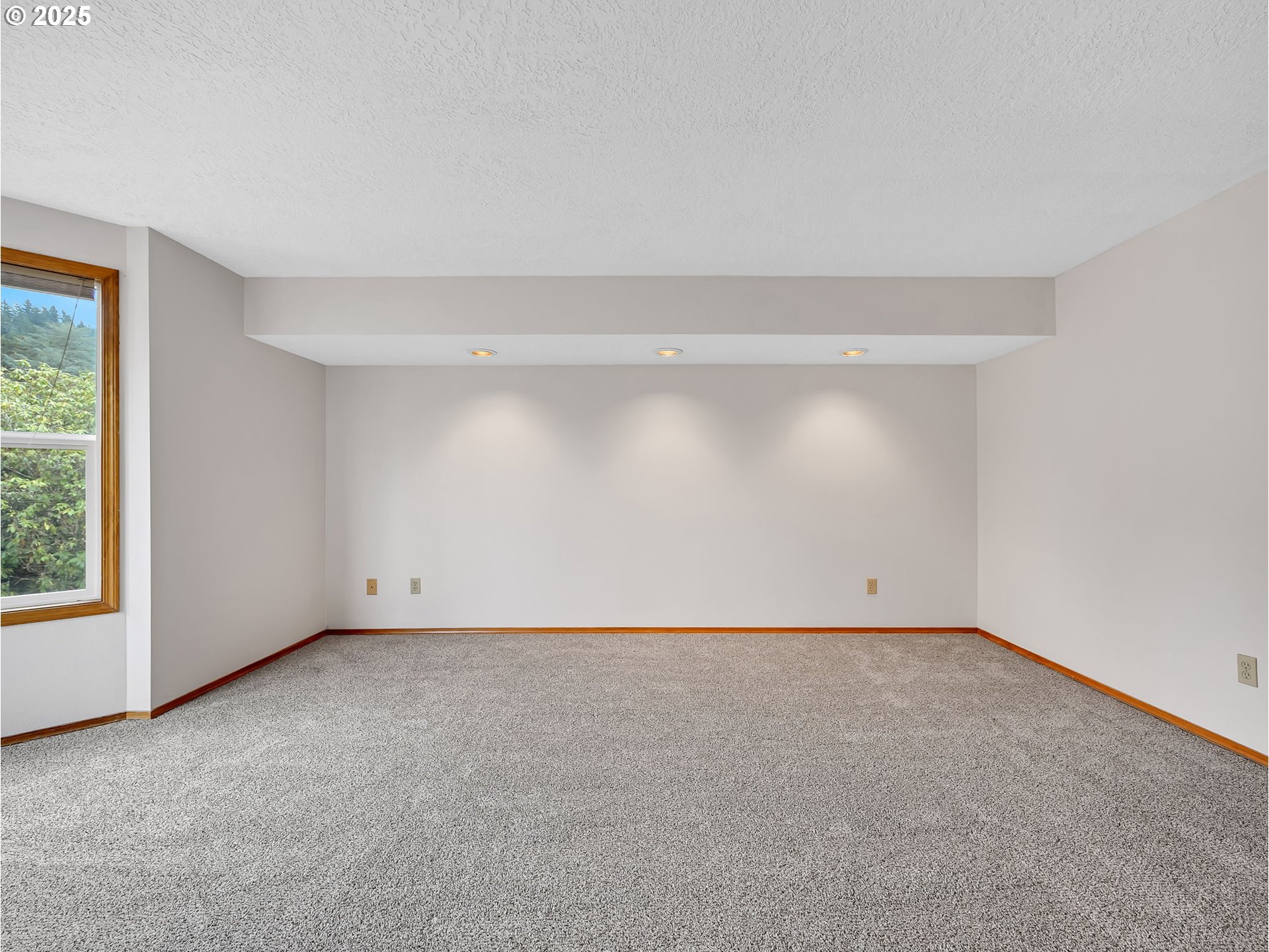 2568 Southwest Orchard Court Gresham, OR 97080 - Photo 20 of 46 a view of an empty room with a window