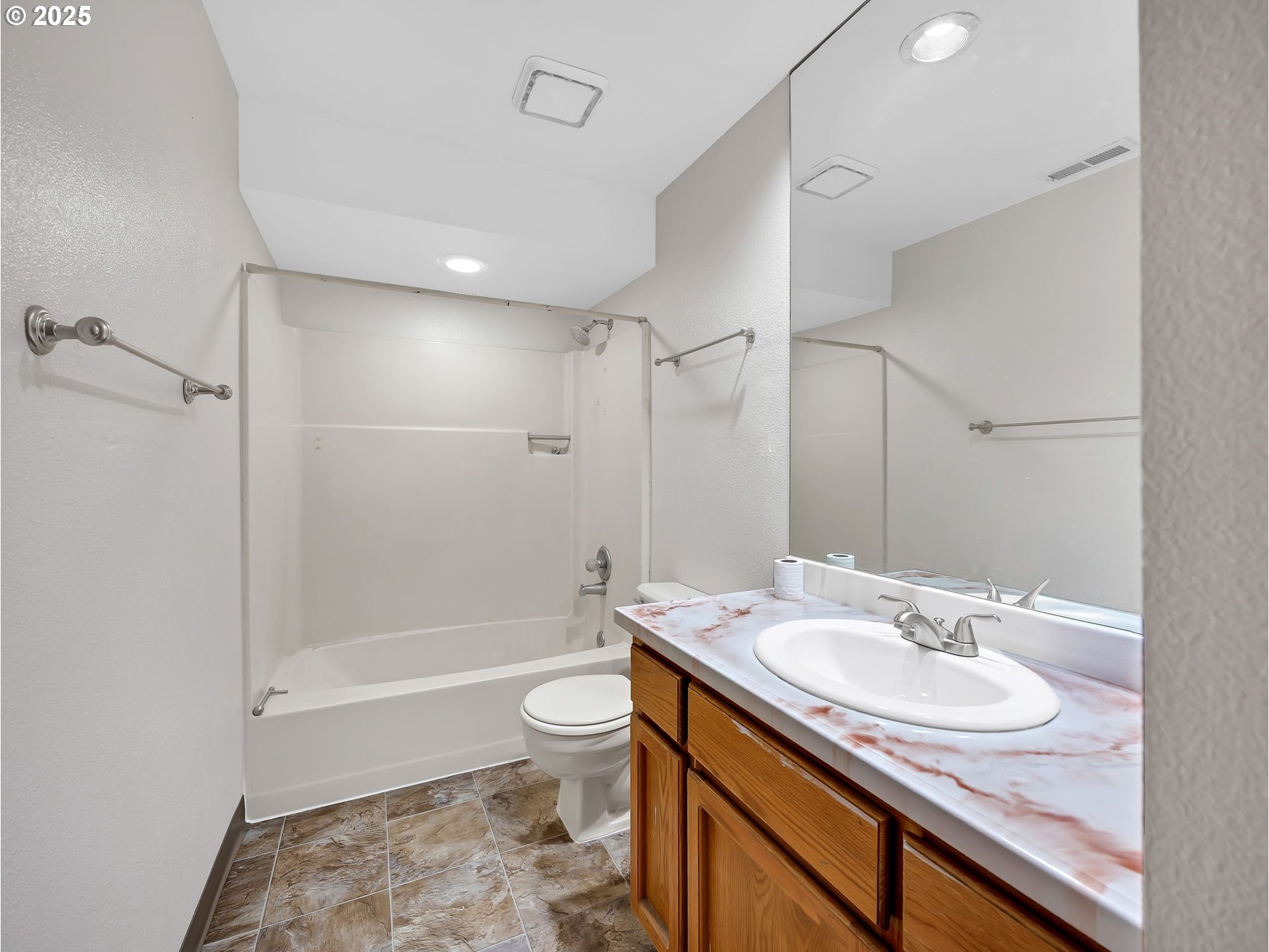 2568 Southwest Orchard Court Gresham, OR 97080 - Photo 29 of 46 a bathroom with a sink a toilet and shower