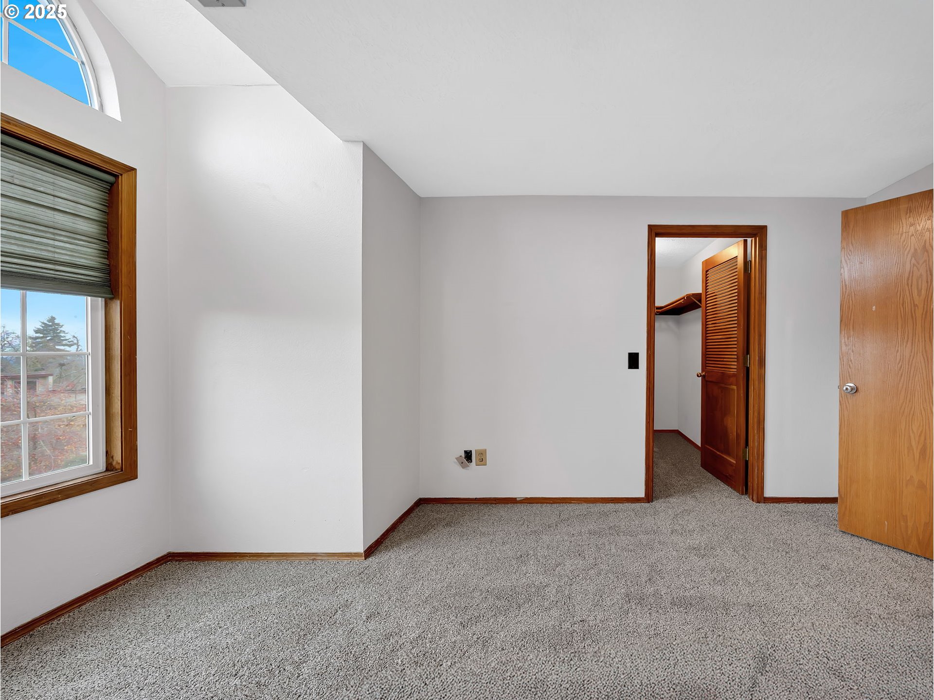 2568 Southwest Orchard Court Gresham, OR 97080 - Photo 32 of 46 a view of an empty room with a window