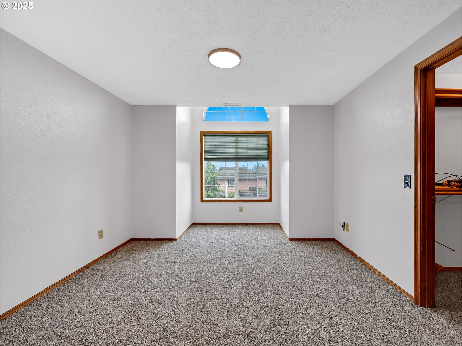 2568 Southwest Orchard Court Gresham, OR 97080 - Photo 33 of 46 a view of an empty room with a window