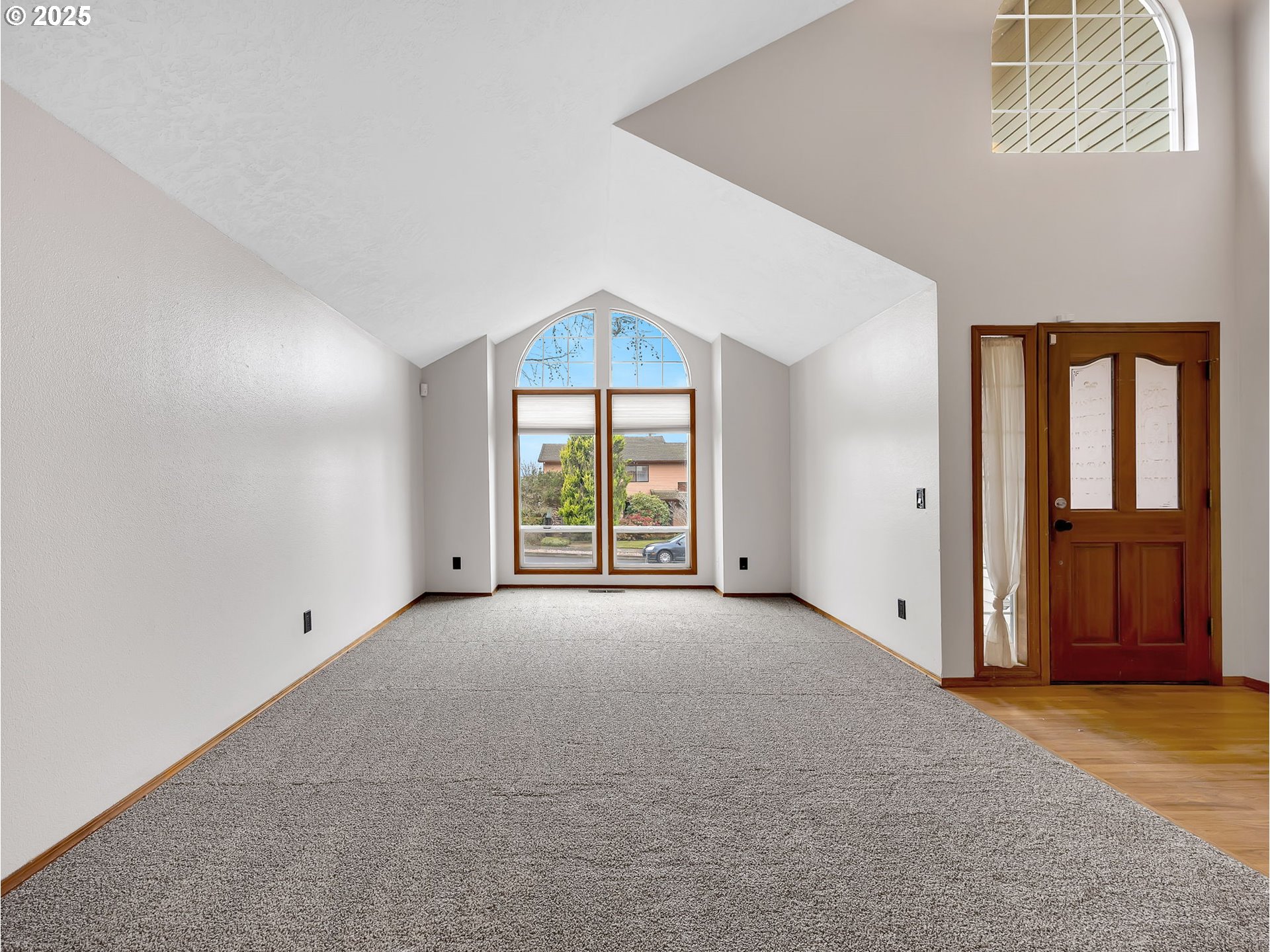 2568 Southwest Orchard Court Gresham, OR 97080 - Photo 4 of 46 an empty room with windows and closet