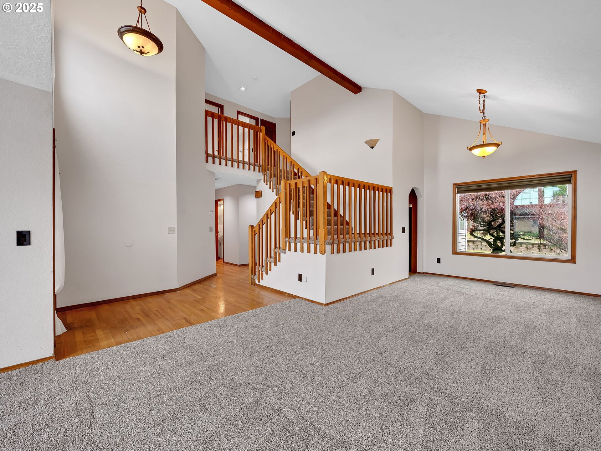 2568 Southwest Orchard Court Gresham, OR 97080 - Photo 6 of 46 a view of a hallway with interior area and natural light