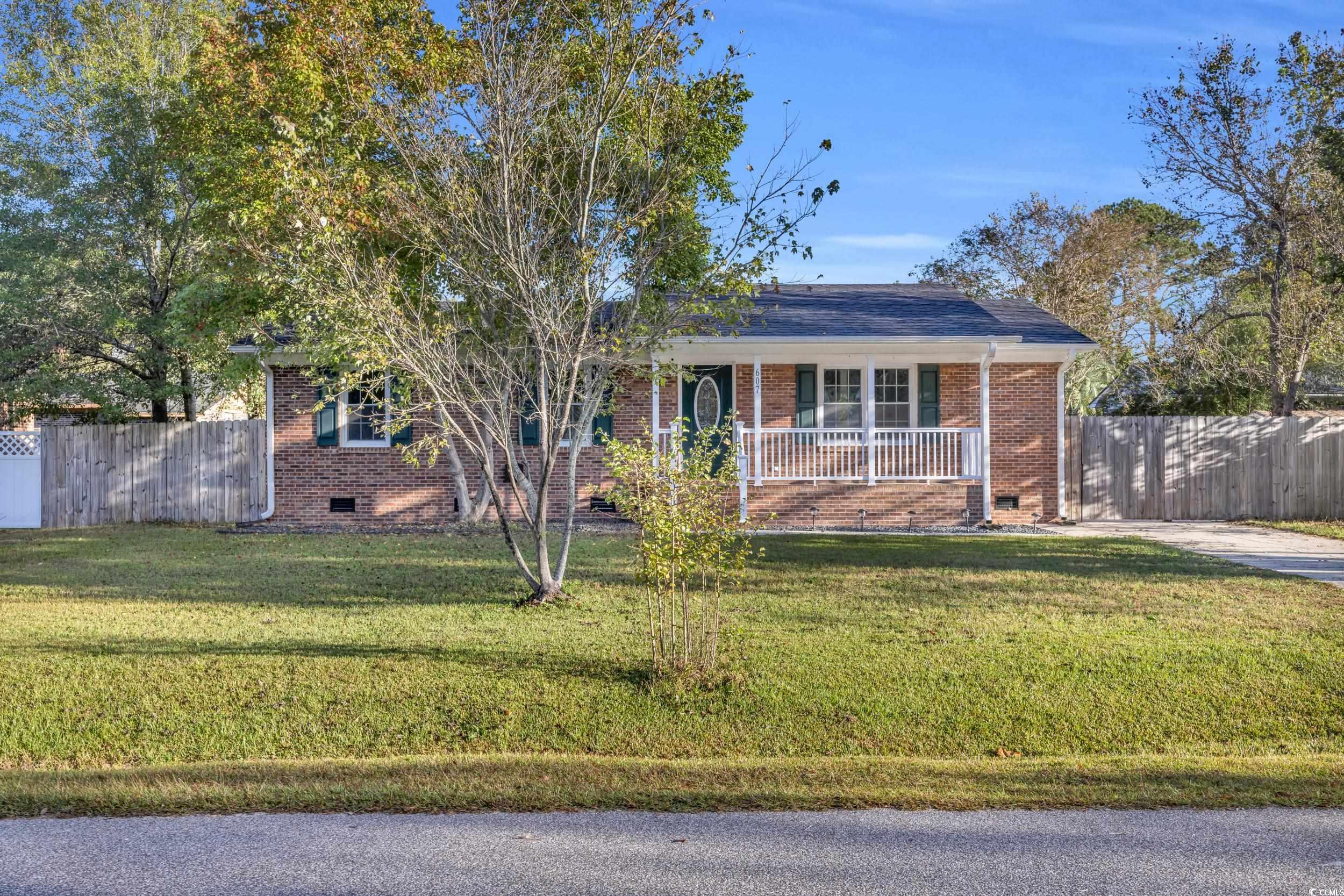 607 Jefferson Way Conway, SC 29526 - Photo 1 of 28 Ranch-style house with a porch and a front lawn