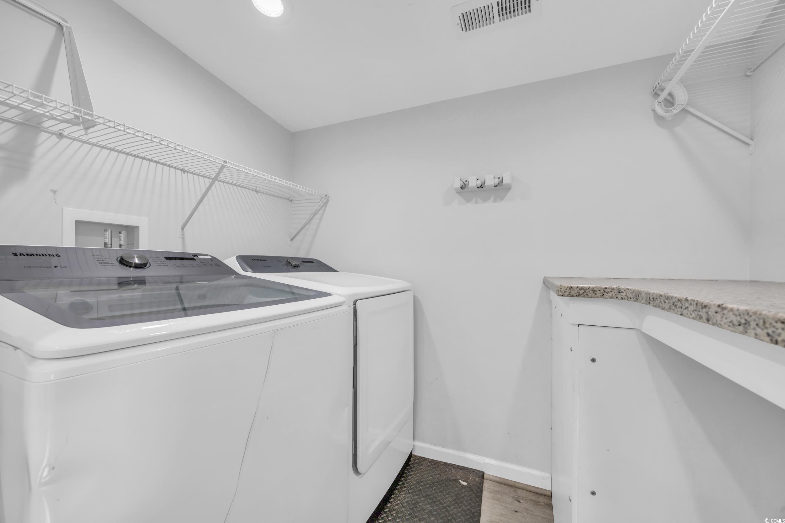607 Jefferson Way Conway, SC 29526 - Photo 13 of 28 Washroom with separate washer and dryer and hardwo