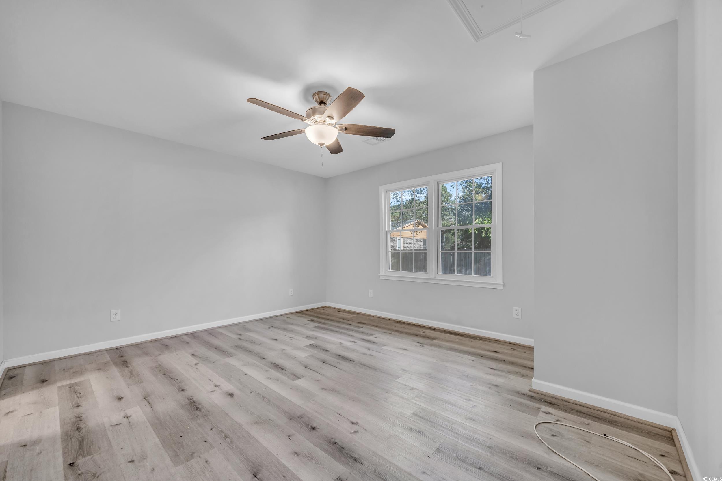 607 Jefferson Way Conway, SC 29526 - Photo 18 of 28 Empty room featuring light hardwood / wood-style f