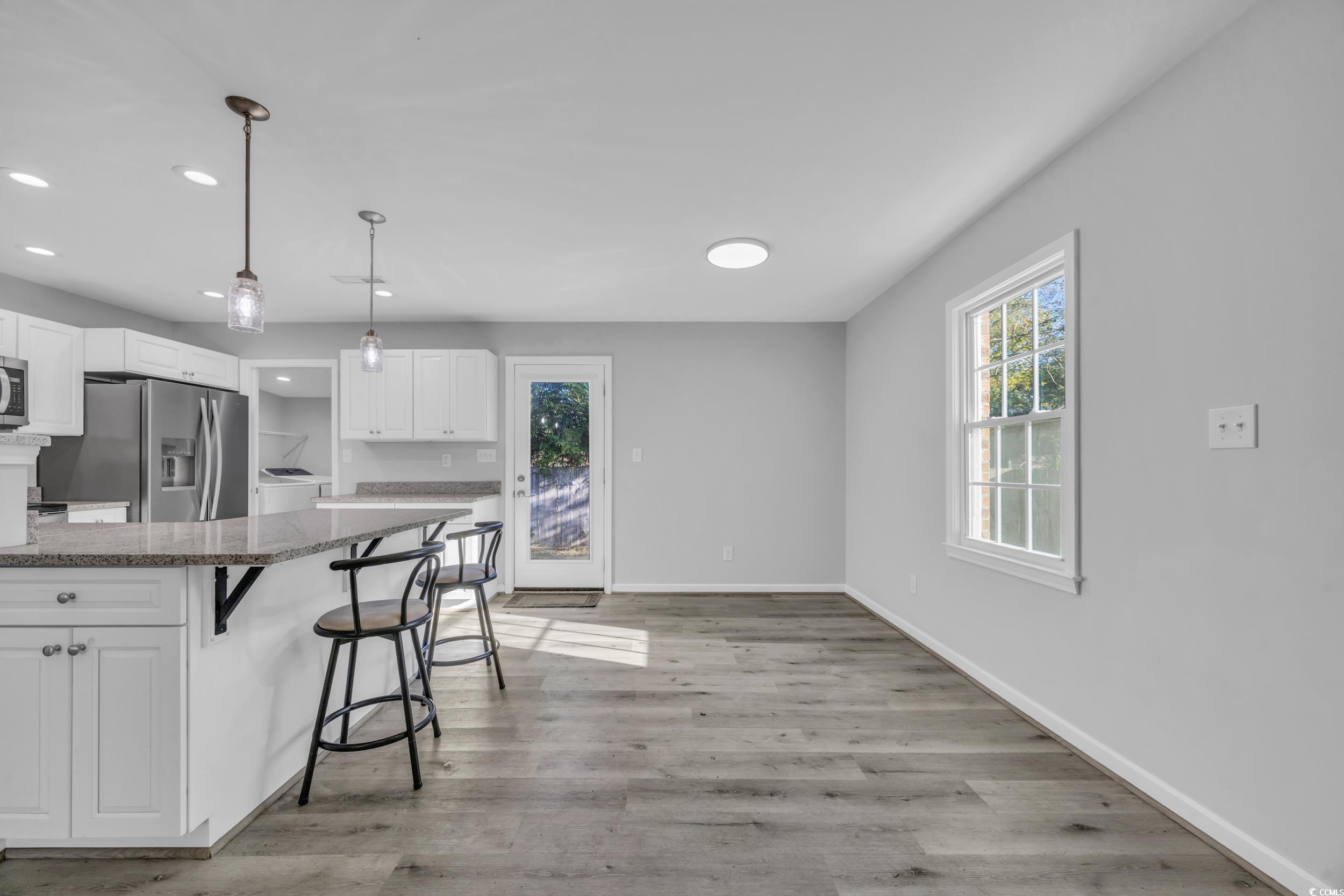 607 Jefferson Way Conway, SC 29526 - Photo 10 of 28 Kitchen featuring light hardwood / wood-style floo