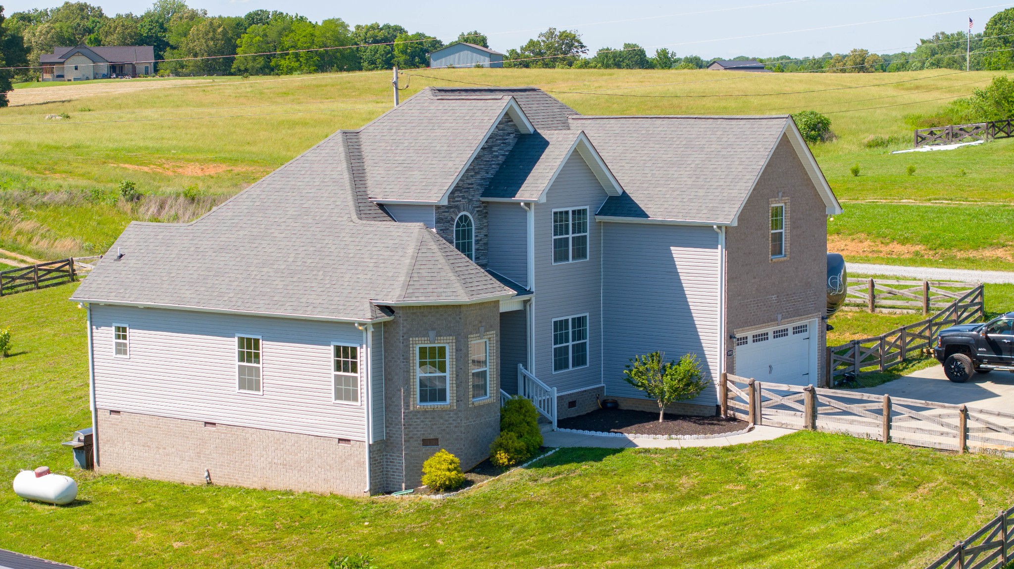 3992 Highway 49 Springfield, TN 37172 - Photo 3 of 68 a aerial view of a house with a garden and lake view
