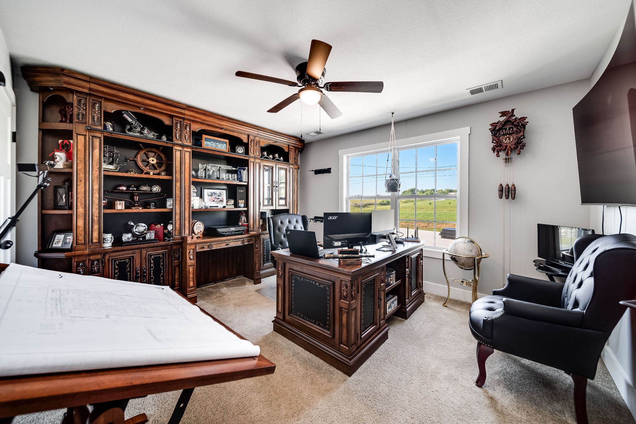 3992 Highway 49 Springfield, TN 37172 - Photo 44 of 68 a living room with furniture a flat screen tv and a table