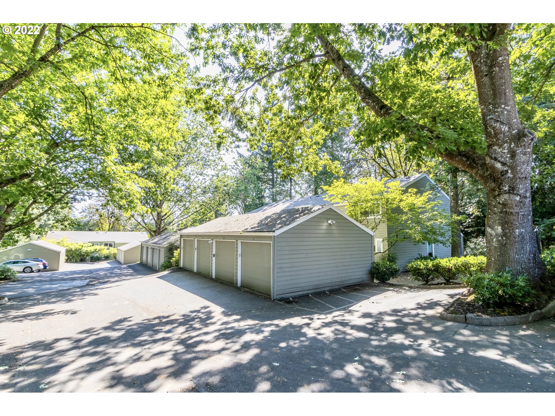 4880 Southwest Scholls Ferry Road, Unit 23 Portland, OR 97225 - Photo 14 of 17 a view of a backyard