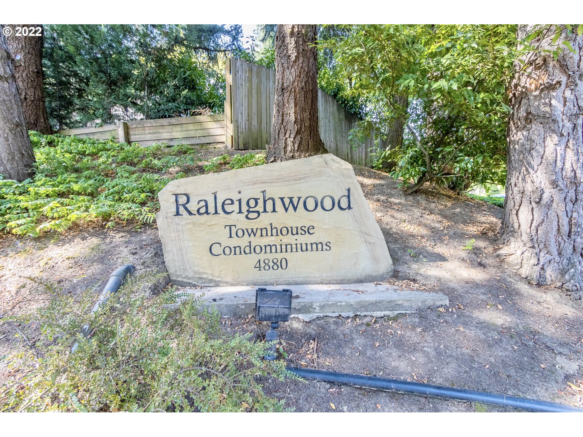 4880 Southwest Scholls Ferry Road, Unit 23 Portland, OR 97225 - Photo 17 of 17 a sign of golf club on a wall