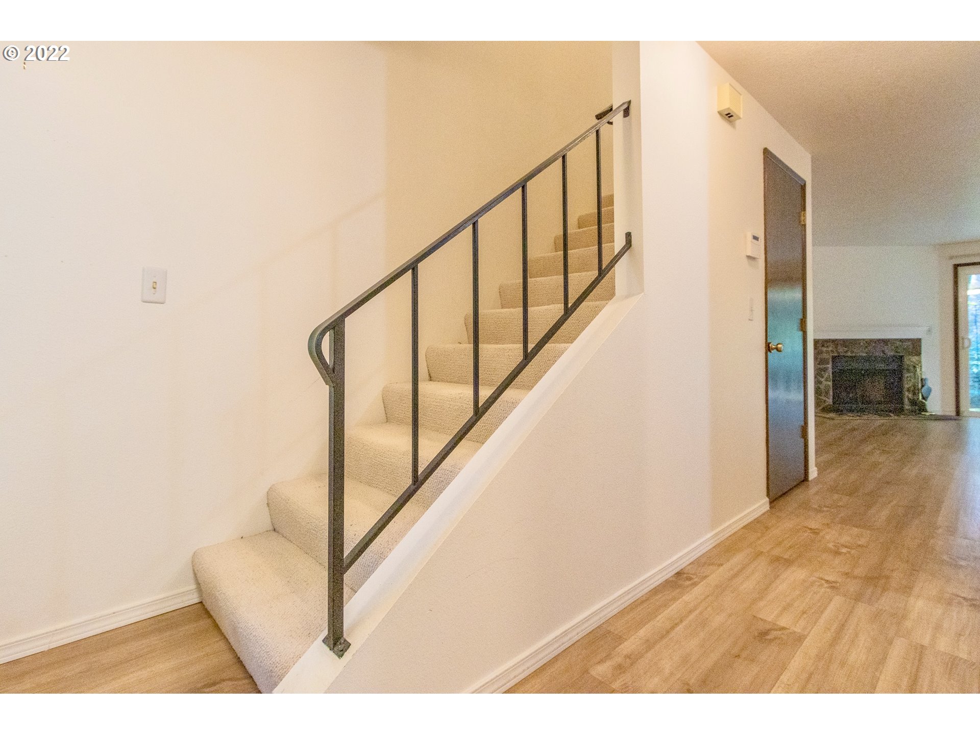 4880 Southwest Scholls Ferry Road, Unit 23 Portland, OR 97225 - Photo 8 of 17 a view of entryway with wooden floor