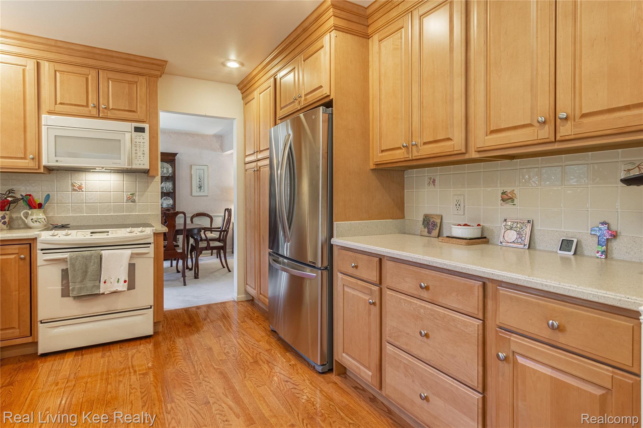 2155 Wayward Drive Rochester, MI 48309 - Photo 13 of 38 GE range, GE Space saver micro and LG ss refrigerator.